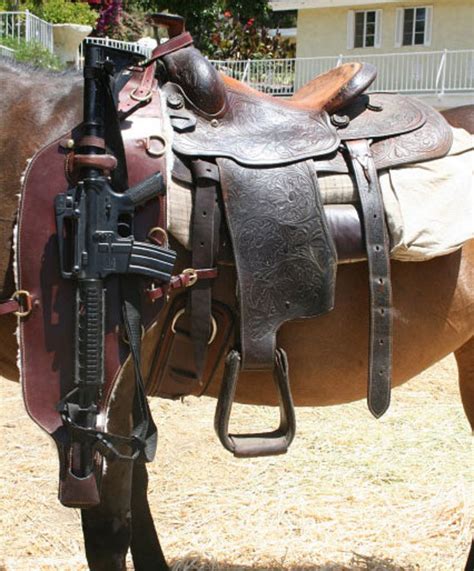 The Leather Rifle <b>Scabbard</b> has two straps designed to hang from your saddle or anywhere else a leather loop may fit such as handle bars of an ATV. . Ar 15 horse scabbard